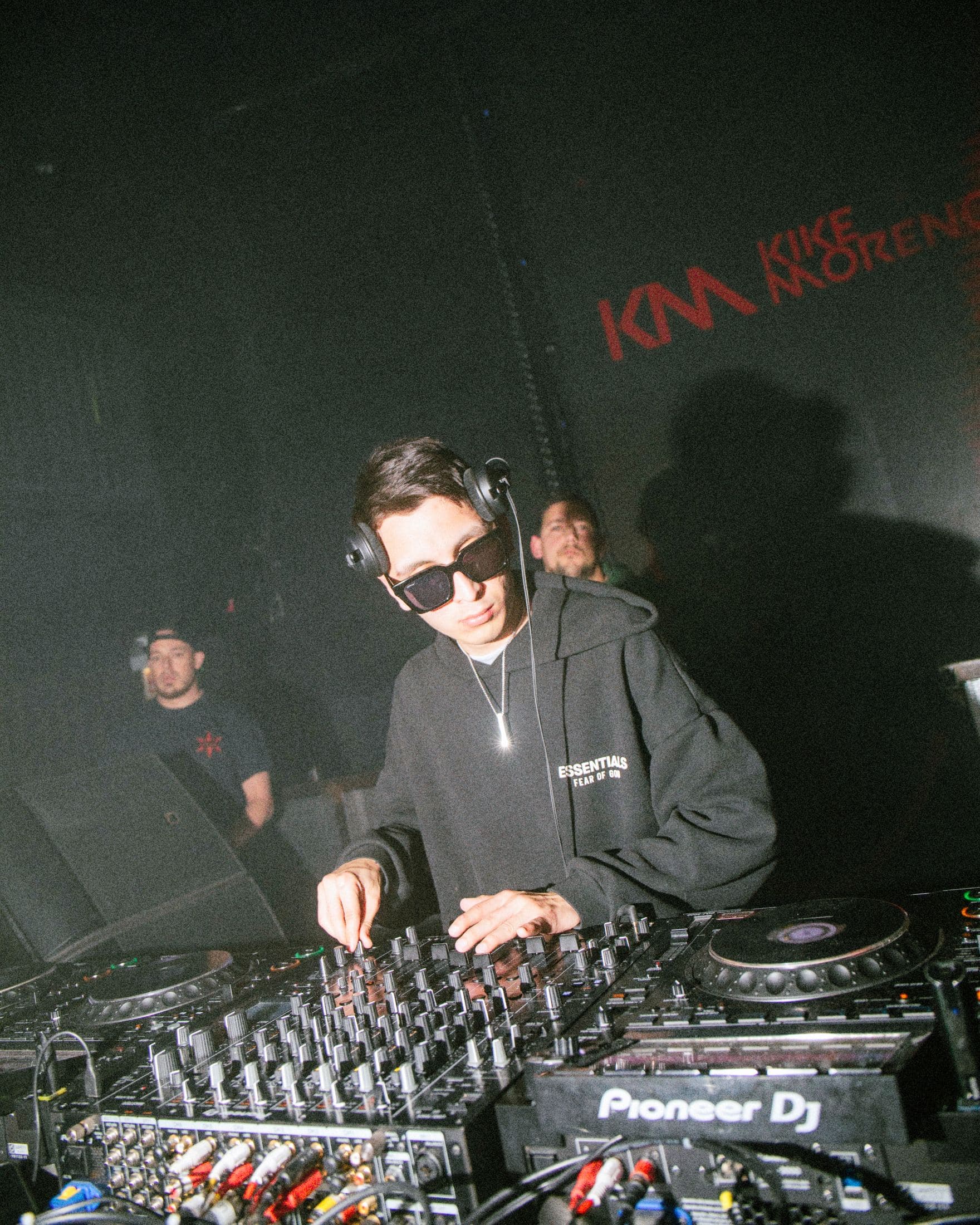 Kike Moreno at the mixer, KM mark painted on the wall behind him